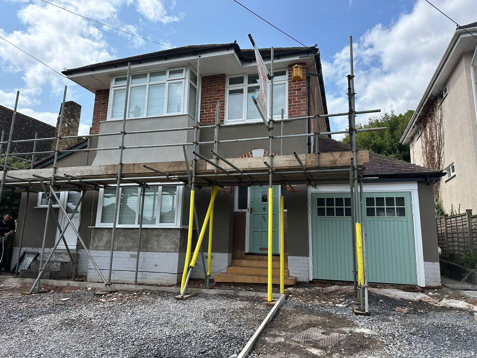 After: full re-render in EcoRend OCR with a Terraline scraped finish, Devon
