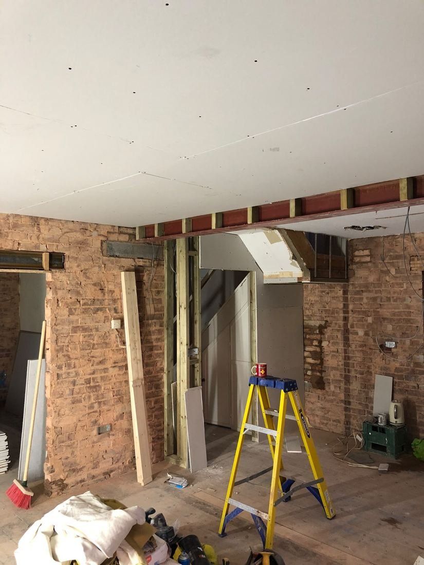 Before — Living room — full strip & re-skim