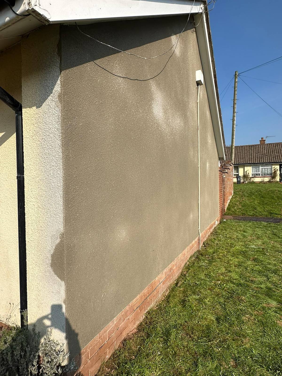 New Terraline render blended against the bungalow's existing finish