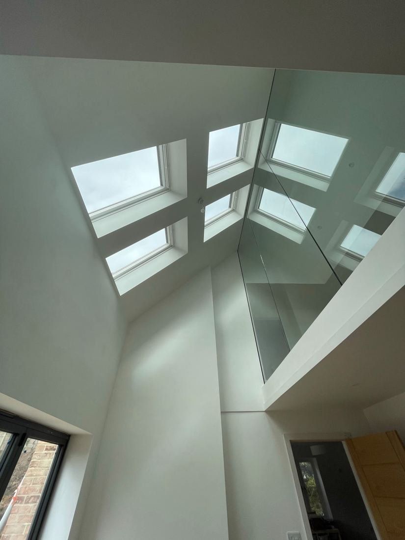 Skylight atrium plastered white